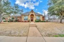 This 4-bedroom, 2.5-bathroom home features a spacious living for sale in Waco Texas Mclennan County County on GolfHomes.com