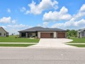 Welcome to this custom-built ranch on Bridgewater's 12th hole for sale in Auburn Indiana Dekalb County County on GolfHomes.com