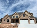 Discover the exceptional new construction in the Estates of for sale in Norman Oklahoma Cleveland County County on GolfHomes.com