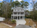 Nestled just a brief 5-minute drive from the picturesque for sale in Wilmington North Carolina New Hanover County County on GolfHomes.com