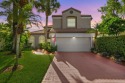 Welcome to your dream home in the highly sought-after gated for sale in Boca Raton Florida Palm Beach County County on GolfHomes.com