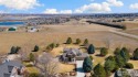 A rare blend of luxury, space, and location, this custom brick for sale in Fort Collins Colorado Larimer County County on GolfHomes.com