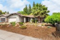 This updated home with breathtaking landscaping offers curb for sale in Chico California Butte County County on GolfHomes.com