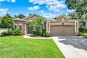 Luxury Pool Home in Gated North Shore at Lake Hart; Conservation for sale in Orlando Florida Orange County County on GolfHomes.com