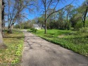 WOW! Don't miss this 1-ACRE Property with Cape Cod style home for sale in Marshall Michigan Calhoun County County on GolfHomes.com