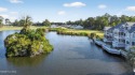 Discover easy, low-maintenance coastal living in this stunning for sale in Ocean Isle Beach North Carolina Brunswick County County on GolfHomes.com
