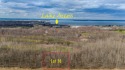 This fantastic wooded golf course lot with access to Houghton for sale in Houghton Lake Michigan Roscommon County County on GolfHomes.com
