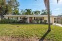 This beautifully updated three-bedroom, two-bathroom pool home for sale in Largo Florida Pinellas County County on GolfHomes.com