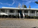 Great starter home in Golf Course estates. 3 bedroom 2 bath in for sale in Ruidoso New Mexico Lincoln County County on GolfHomes.com