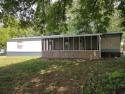 Kentucky Lake - 2BR/1BA mobile home with a 12x22 screened porch for sale in Springville Tennessee Henry County County on GolfHomes.com
