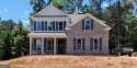 A golfer's paradise! This 4-bedroom, 3-bathroom home with 9' for sale in Covington Georgia Newton County County on GolfHomes.com