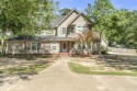 Welcome to 16 Woodcrest Drive in Searcy-- a 4-bed, 2.5-bath home for sale in Searcy Arkansas White County County on GolfHomes.com