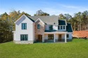 This extraordinary new construction, custom home with craftsman for sale in Forsyth Georgia Monroe County County on GolfHomes.com