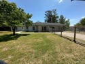Conveniently located between Charlotte and Columbia, this ranch for sale in Kershaw South Carolina Lancaster County County on GolfHomes.com