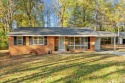 This BEAUTIFUL 3-bedroom BRICK home is located a short walk away for sale in Dalton Georgia Whitfield County County on GolfHomes.com