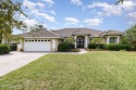 BRAND NEW TILE ROOF! Relax and Enjoy the Baytree Lifestyle in for sale in Melbourne Florida Brevard County County on GolfHomes.com