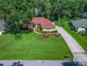 One or more photos have been digitally staged or altered for sale in Dunnellon Florida Marion County County on GolfHomes.com