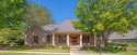 Welcome to 104 Laird Avenue--your dream home nestled in the for sale in Madison Mississippi Madison County County on GolfHomes.com