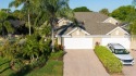 Nestled in the heart of Viera East Golf Course, this villa for sale in Rockledge Florida Brevard County County on GolfHomes.com