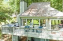 Newly renovated in 2022 and situated on Sconti Lake within Lake for sale in Big Canoe Georgia Pickens County County on GolfHomes.com