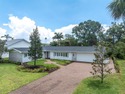 Travel down a stately, brick-paved street framed by for sale in St. Petersburg Florida Pinellas County County on GolfHomes.com