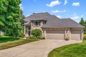 Enjoy serene cul-de-sac living in the highly sought-after for sale in Portage Michigan Kalamazoo County County on GolfHomes.com