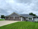 Beautiful Golf Course Retreat on .62 Acres - Move~In Ready for sale in Sioux Center Iowa Sioux County County on GolfHomes.com