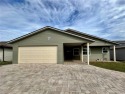 Welcome to your dream home in the heart of a gated golf for sale in Lakeland Florida Polk County County on GolfHomes.com