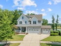 This stunning 7-bedroom, 6-bathroom custom-crafted home located for sale in Holly Springs North Carolina Wake County County on GolfHomes.com