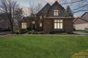 Step into this stunning 4-bedroom brick colonial located in the for sale in Clarkston Michigan Oakland County County on GolfHomes.com