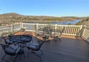 Enjoy stunning views of Table Rock Lake from the upper deck for sale in Holiday Island Arkansas Carroll County County on GolfHomes.com