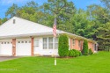 Welcome to this beautifully updated Oakwood II model, a charming for sale in Whiting New Jersey Ocean County County on GolfHomes.com