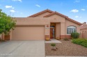 This Canada Hills home in Oro Valley offers a stunning setting for sale in Oro Valley Arizona Pima County County on GolfHomes.com