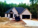Brand new 1885 square foot home on lovely lot. Trees surround for sale in Hot Springs Village Arkansas Saline County County on GolfHomes.com