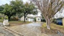 Nestled in the serene and sought-after Northern Hills for sale in San Antonio Texas Bexar County County on GolfHomes.com