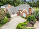 Perfectly situated on the 18th Fairway with Shimmering LAKE for sale in Roswell Georgia Fulton County County on GolfHomes.com
