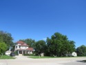 This charming Victorian home with wraparound covered porch for sale in Pocahontas Iowa Pocahontas County County on GolfHomes.com