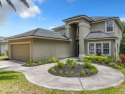 Prior model home featuring a finished air-conditioned garage and for sale in St Augustine Florida Saint Johns County County on GolfHomes.com