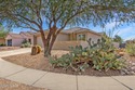 Welcome to this charming home in Qual Crossing at Dove Mountain! for sale in Marana Arizona Pima County County on GolfHomes.com