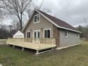 Very nicely updated story and a half home overlooking the Pine for sale in Standish Michigan Arenac County County on GolfHomes.com