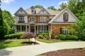 ULTRA PRIVACY IN MILTON WITH SEASONAL LAKE VIEWS! Live the for sale in Milton Georgia Fulton County County on GolfHomes.com
