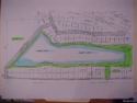 Discover your own slice of paradise with this wooded waterfront for sale in Stanwood Michigan Mecosta County County on GolfHomes.com