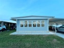 BRING YOUR PICKIEST BUYERS to this open and impeccably for sale in Largo Florida Pinellas County County on GolfHomes.com