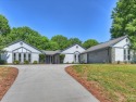Beautifully renovated in 2023, this Raintree ranch home is an for sale in Charlotte North Carolina Mecklenburg County County on GolfHomes.com