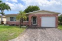 Welcome to Crystal Lake Golf Villas Phase 2, a vibrant and for sale in Deerfield Beach Florida Broward County County on GolfHomes.com