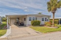 Indulge in breathtaking panoramic golf course views and for sale in Port Charlotte Florida Charlotte County County on GolfHomes.com