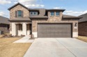 Beautiful Two-story home built by Aston Woods Homes. Brick and for sale in Fort Worth Texas Tarrant County County on GolfHomes.com