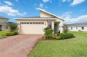 Welcome to your dream home in a serene golf course community for sale in Harmony Florida Osceola County County on GolfHomes.com