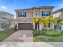 Experience luxury in one of Delray Beach's newer built gated for sale in Delray Beach Florida Palm Beach County County on GolfHomes.com