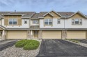 Multi-level walkout townhome with mature pine tree privacy. 3 BR for sale in Victoria Minnesota Carver County County on GolfHomes.com